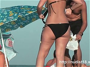 nude beach hidden cam video of sizzling playful nudists in water